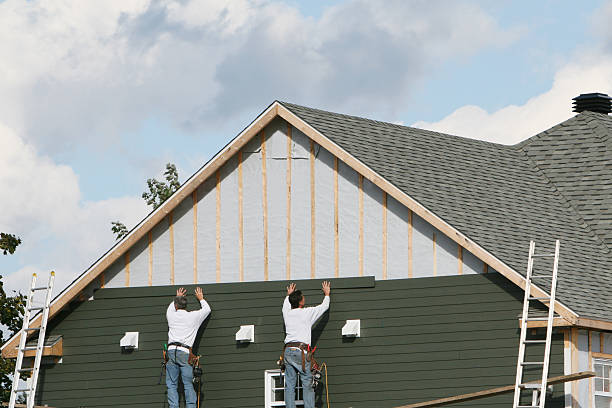 Professional Siding technician working in Sharpsburg, GA